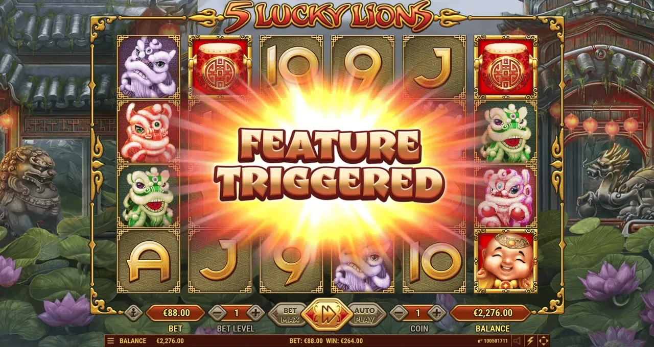 5 Lucky Lions: A FEATURE TRIGGERED banner across the reels in Habanero's shot, with red...