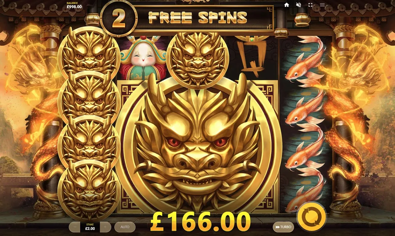 Dragon's Luck Deluxe: Red Tiger's own screenshot at a £2.00 stake: a counter reading 2 FREE SPINS,...