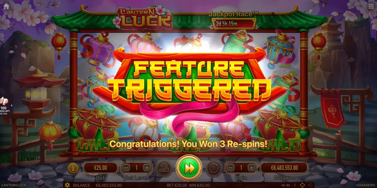 Lantern Luck: A FEATURE TRIGGERED banner over the reels with 'Congratulations! You Won 3...