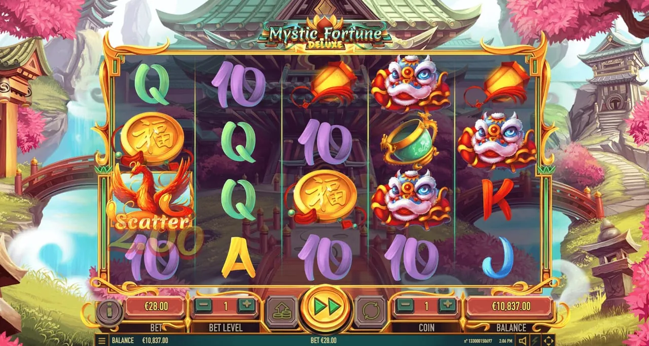 Mystic Fortune Deluxe: Ten different symbols in one frame: the phoenix scatter on reel one, gold...