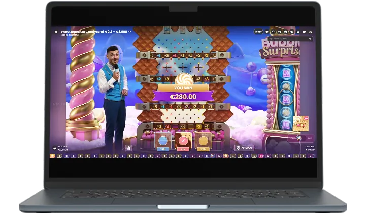 Sweet Bonanza CandyLand: Pragmatic's image of the Candy Drop bonus on a laptop: a presenter with a...